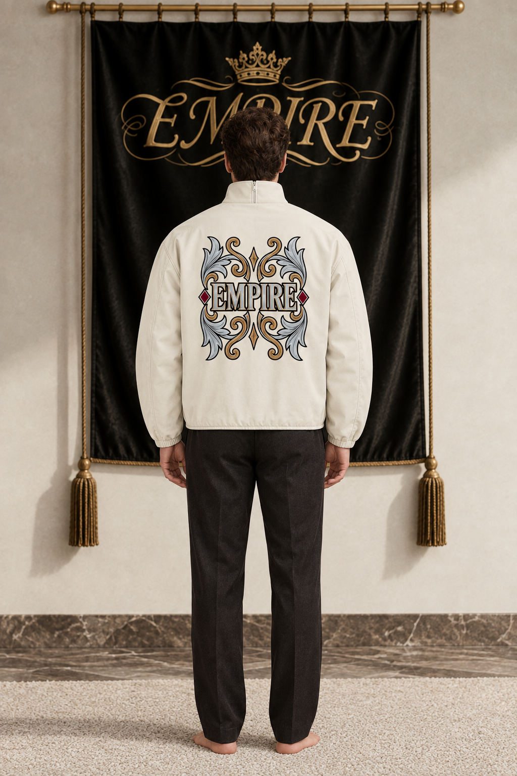 Light ivory men's EMPIRE Sovereign Ornament stand-collar jacket with large symmetrical ornamental frame and central wordmark, back view