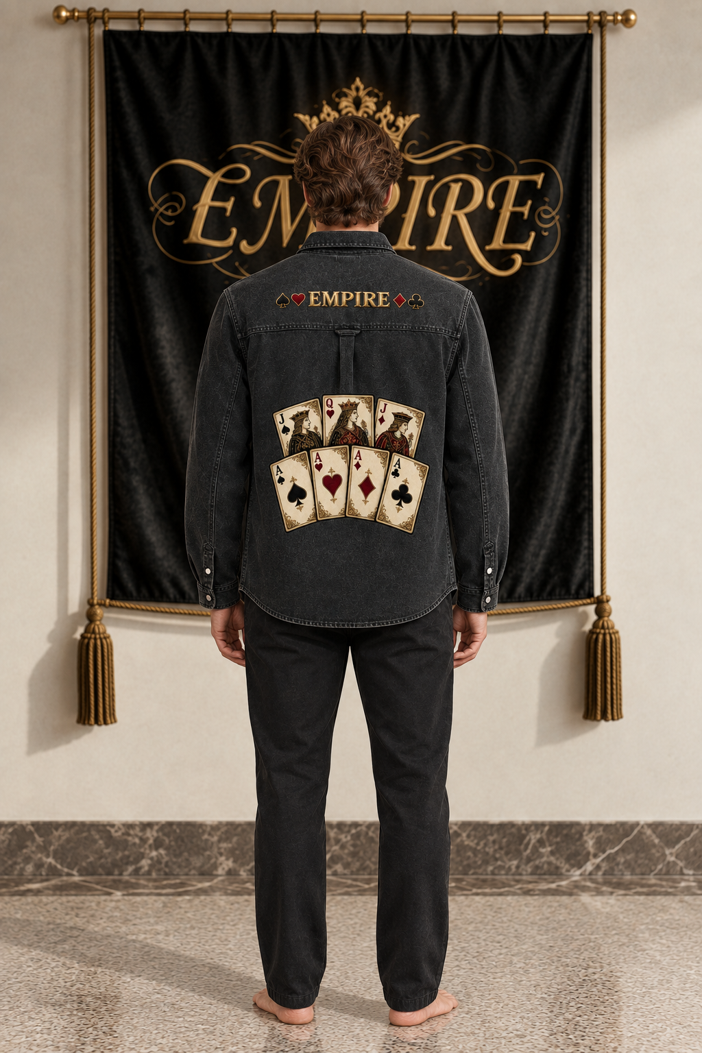 Black washed denim men's EMPIRE Royal Deck jacket with playing card fan and upper suit wordmark, back view