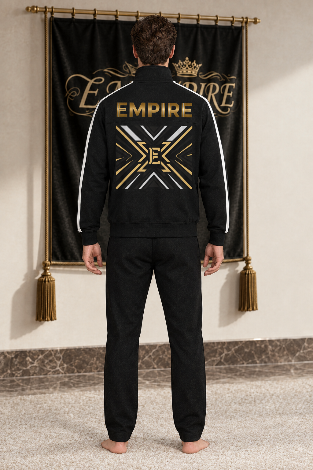 Black men's EMPIRE stand-collar jacket with white side stripes and gold-and-white velocity back graphic, rear view on barefoot male model