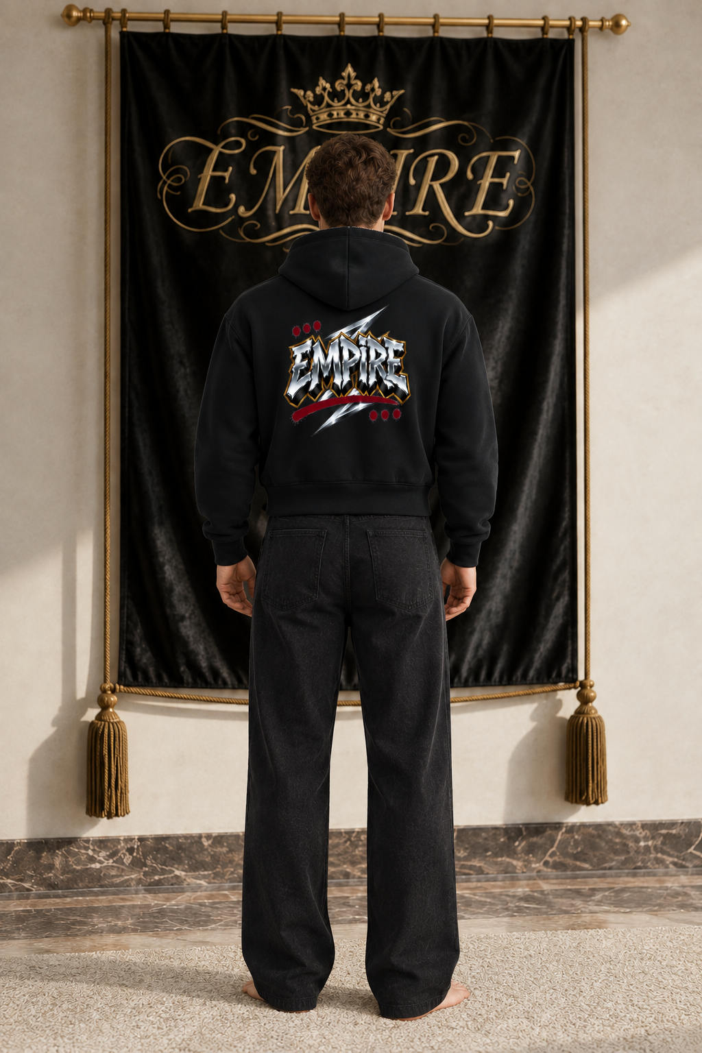 Black men's EMPIRE Chrome Tag cropped fleece zip-up hoodie with large metallic wordmark, silver lightning bolts and red accents, back view