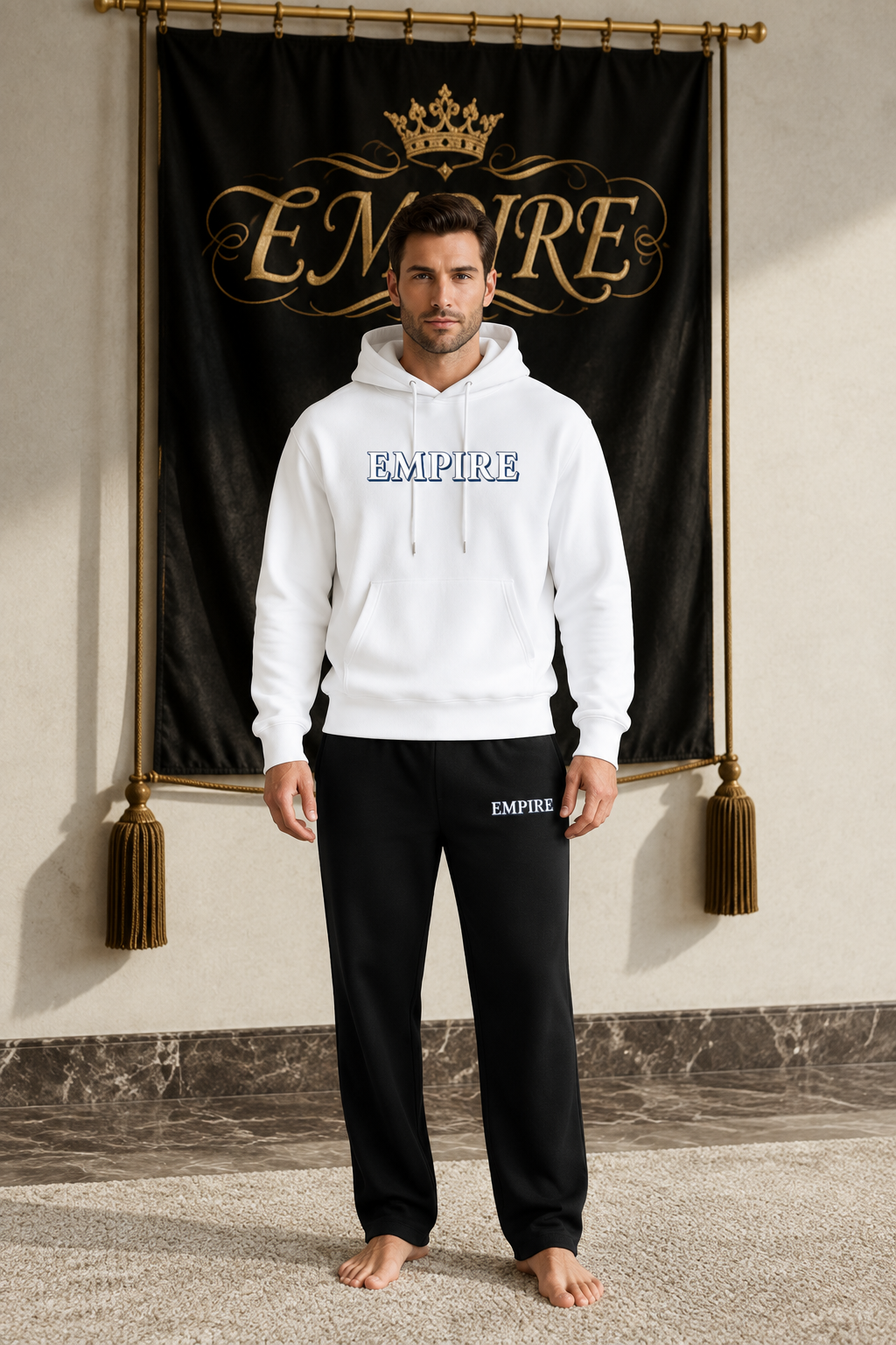 White men's EMPIRE heavyweight cotton hoodie with outlined chest wordmark, front view on barefoot male model