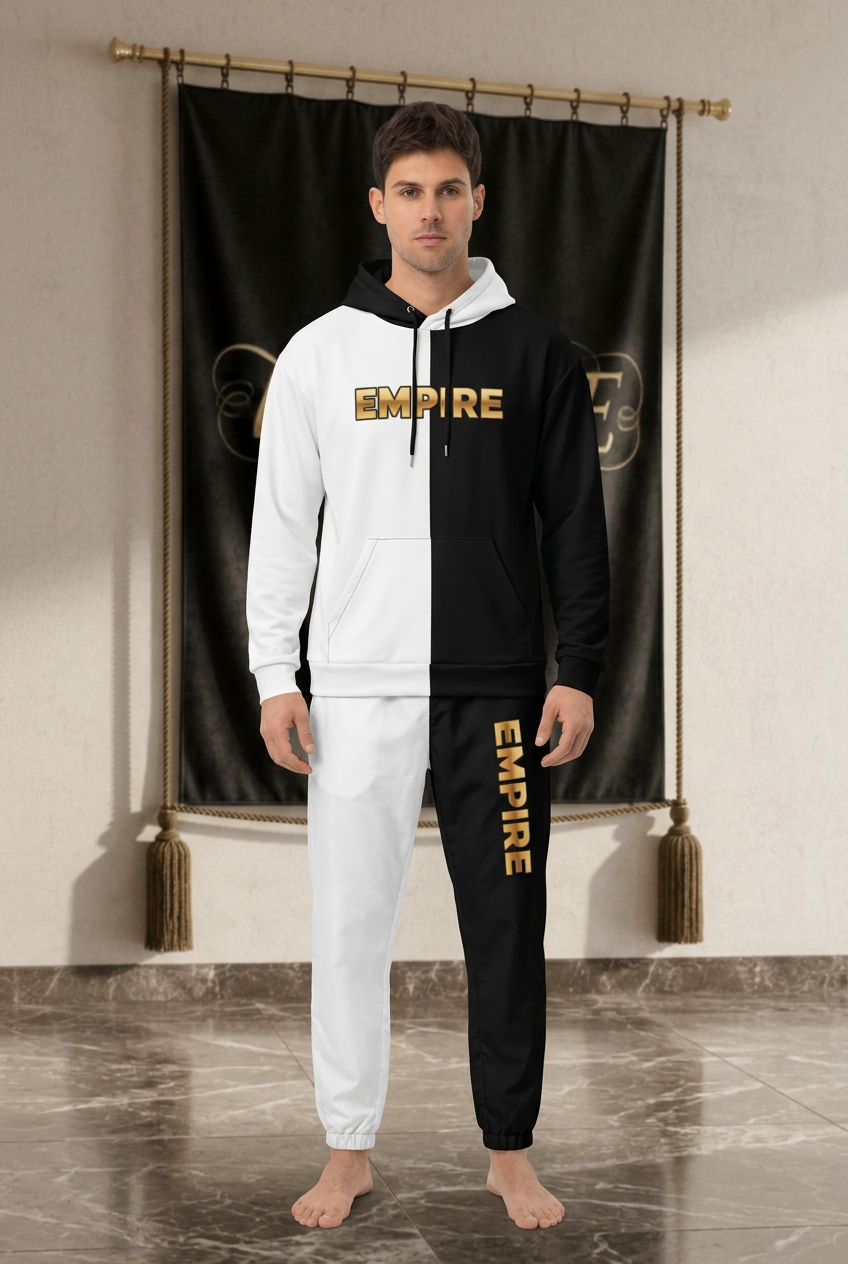 EMPIRE men's Split Design black-and-white hoodie and track pants with gold-toned lettering, worn front view.