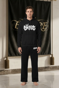 EMPIRE men's Graffiti set, black pullover hoodie with white graffiti lettering and matching black wide-leg pants, worn front view.