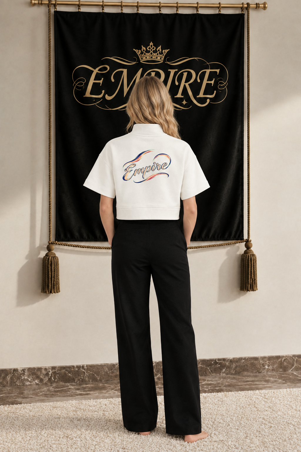 Ivory women's EMPIRE short-sleeve cropped sweatshirt with large cursive back wordmark and blue, pink-red and pale gold flourishes, rear view