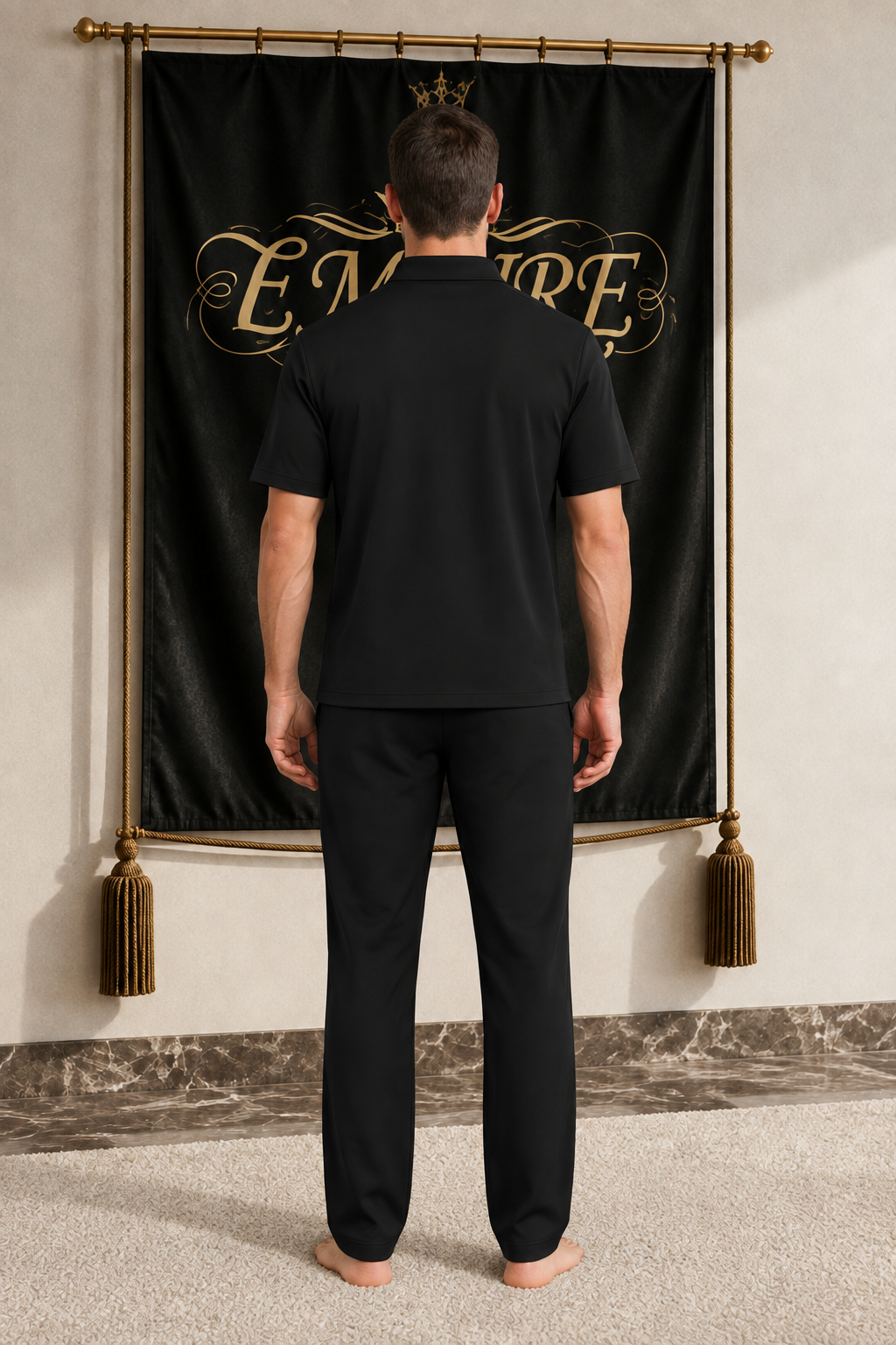 Black men's EMPIRE quarter-zip performance polo with plain back, rear view on barefoot male model