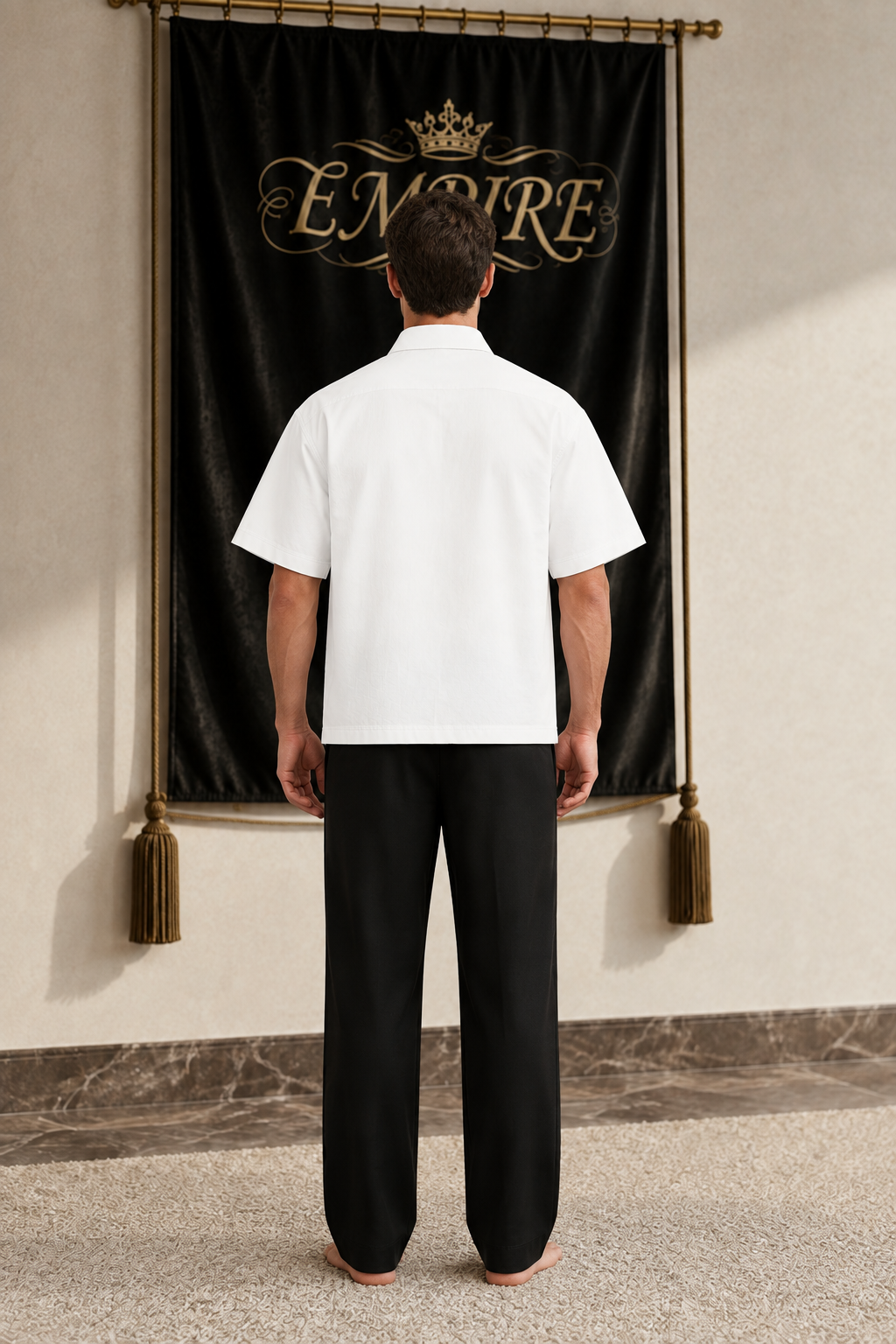 White men's EMPIRE boxy short-sleeve shirt with plain back, rear view on barefoot male model
