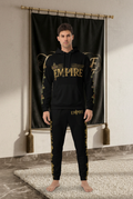 EMPIRE King Cross men's black hoodie and matching joggers with gold-toned designs, worn front view.